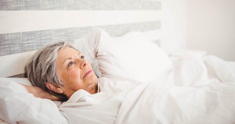 Older Woman In Bed