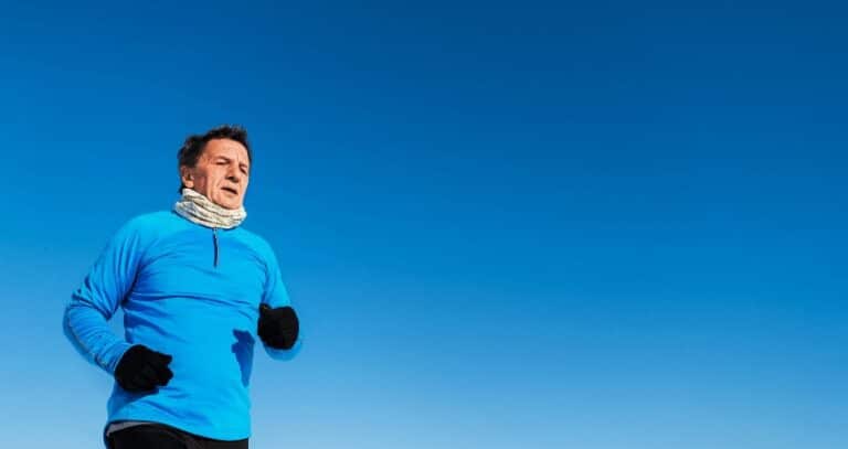 Man Jogging On A Cold Clear Day