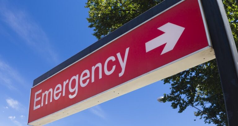Sign Pointing The Way To The Emergency Room