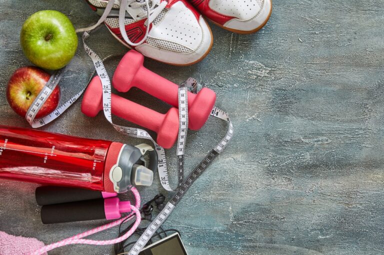 Water Bottle, Apples, And Exercise Equipment